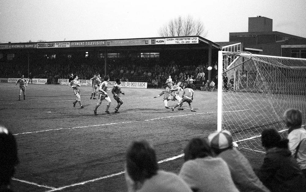 Boxing Day football match with spectators watching intently