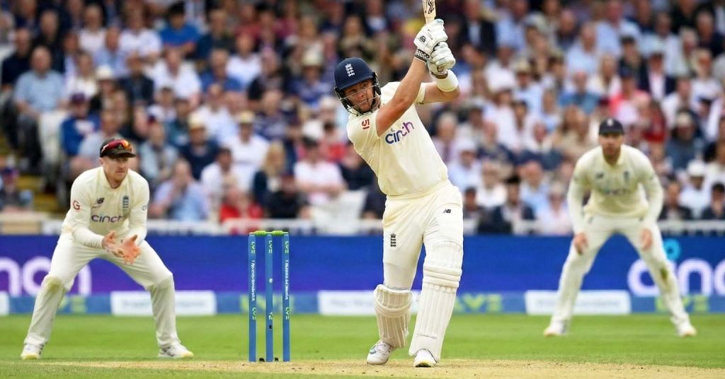 Cricketer batting in a match.