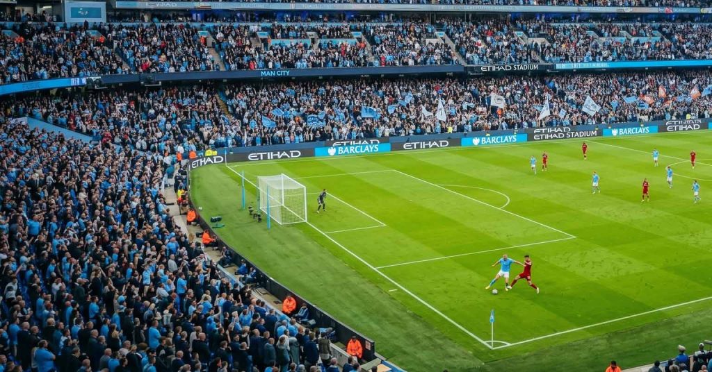 Crowd cheering Premier League opening day